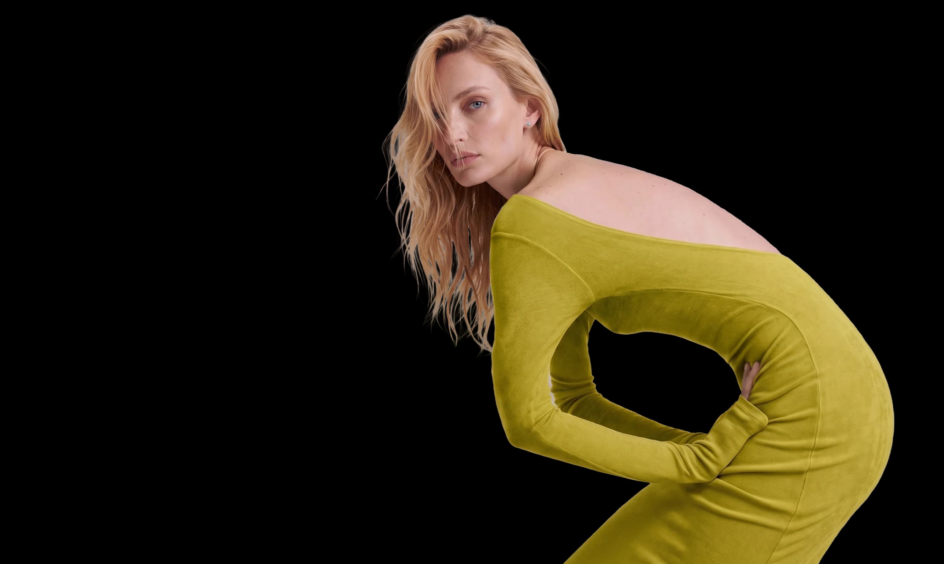 Model wearing an olive green off-shoulder dress